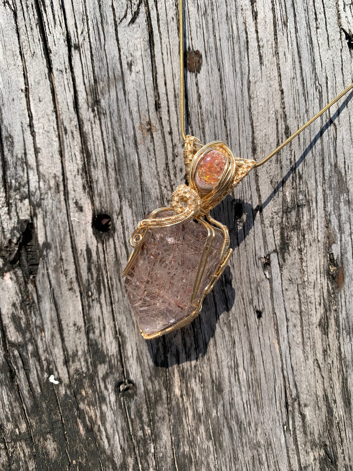 Rutilated Quartz with Opal on Aegisjalmur Matrix